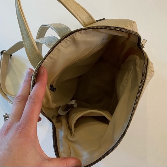 Backpack  color Bone New 4 zip pockets & 2 sleeve pockets Excellent condition - Picture 7 of 8